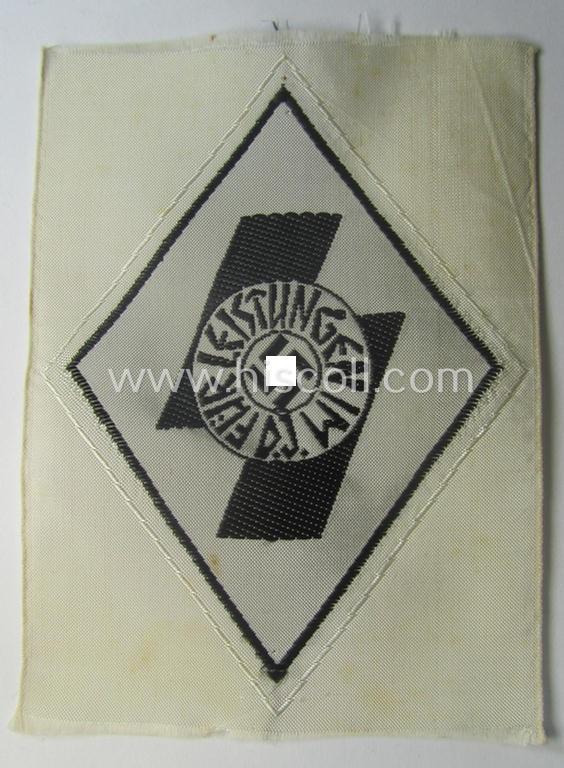 DJ- (ie. 'Deutsches Jungvolk'-) 'Leistungsabzeichen in Eisen in Stoff' that retains its period-attached 'RzM'-etiket