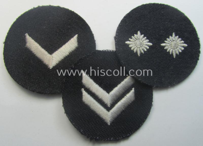 Interesting - and hardly ie. even never used! - 3-pieced, DJ- (ie. 'Deutsches Jungvolk in der HJ') insignia-set comprising of three darker-blue-toned rank-patches (ie. 'Rangzeichen') all three still holding their period-attached 'RzM'-etikets