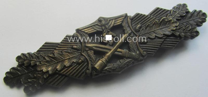 'Nahkampfspange in Bronze' (or: bronze-class close-combat clasp ie. CCC) being a neatly maker-marked- and/or minimally converse-shaped specimen as was produced by the: 'JFS'- (ie. 'Joseph Feix u. Söhne'-) company