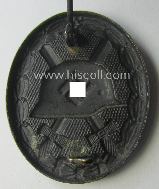 Moderately used- and/or worn, black-class wound-badge (or: 'Verwundeten-Abzeichen in Schwarz') being a typical non-magnetic and/or non-maker-marked example