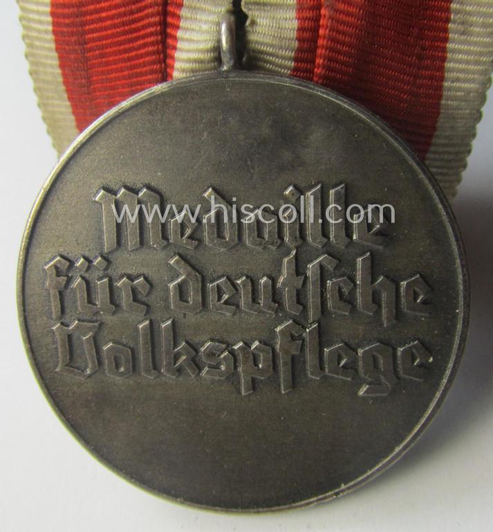 Single-pieced and non-detachable, single-pieced medal-bar (ie. 'Orden- o. Einzelspange') showing a: 'Deutsche Volkspflege'- (ie. civil-service-) medal