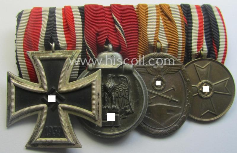 4-pieced, WWII-period medal-bar (ie. 'Ordenspange') showing resp. an: 'EKII.Kl.', a: 'Medaille Winterschlacht im Osten 1941-42' a: 'KvKII.Kl. m. Schw.', a: 'Westwall'-medal and 'Kriegsverdienstmed. 1939'