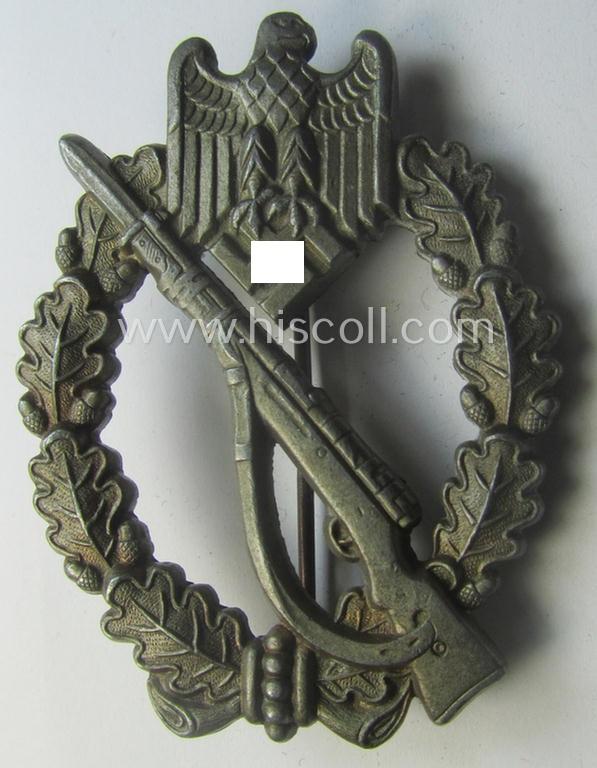 'Infanterie Sturmabzeichen in Bronze' (or bronze-class IAB) being a non-maker-marked, typical zinc- (ie. 'Feinzink'-) version ie. 'variant' as was (I deem) procuded by the: 'Funcke u. Brüninghaus'-company