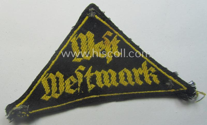 Truly used- and/or tunic-removed, HJ/BDM ('Hitlerjugend' ie.: 'Bund Deutscher Mädel') district-triangle (ie. 'Gebietsdreieck') entitled: 'West Westmark' (being a used example that is void of an 'RzM'-etiket)