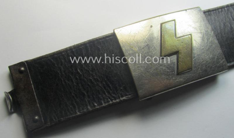 Complete(!) DJ (ie. 'Deutsches Jungvolk') silver-coloured- (ie. typical nickle-chromed) belt-buckle (ie. 'Koppelschloss') being a maker- (ie. 'RzM U.E. 72'-) marked example that comes mounted onto its (nicely marked), leather-based belt