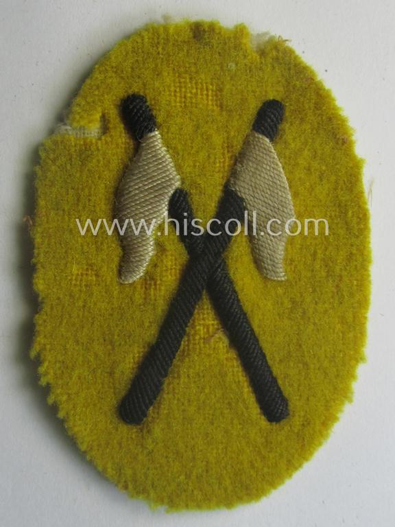 Early-period, HJ- (ie. 'Hitlerjugend') trade- or: specialist-armbadge as executed in the hand-embroidered pattern as was intended for usage by a: 'Reiter-HJ'-member (or: mounted-HJ-member) still retaining its period 'RzM'-etiket