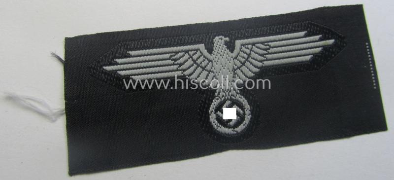 Mid- (ie. later-) war-pattern 'Waffen-SS'-type so-called: 'BeVo'-pattern, EM- (ie. NCO-) type side-cap eagle that comes in a never used- (ie. unconfectioned and 'virtually mint- ie. unissued'-), condition