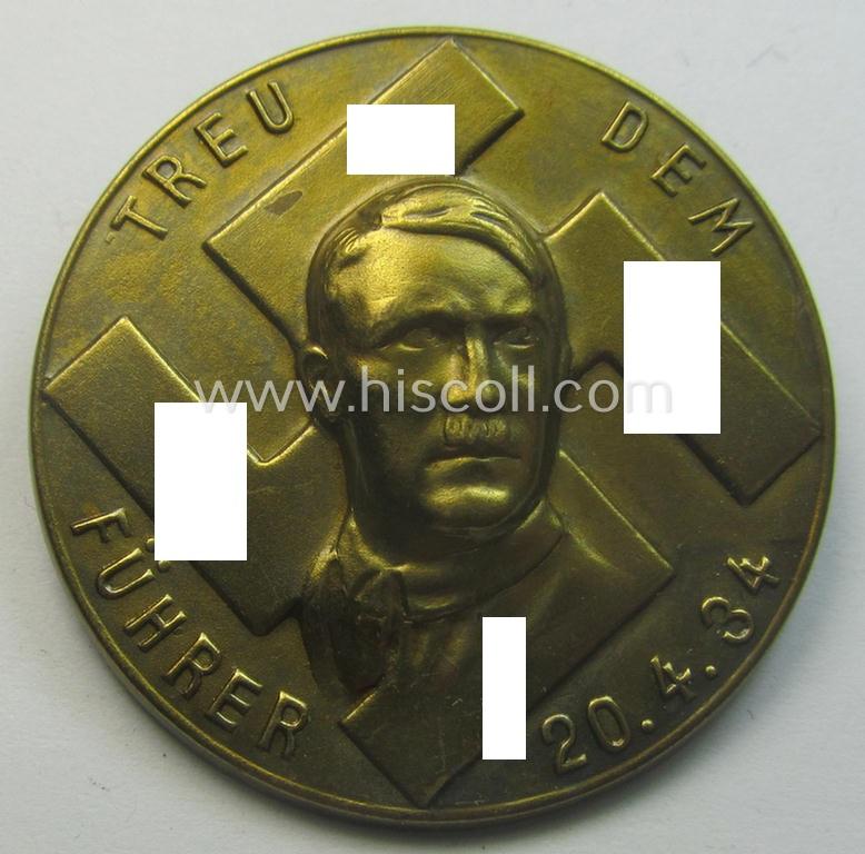 Commemorative, N.S.D.A.P.-related 'tinnie' or day-badge being a non-maker-marked example depicting detailed illlustration of 'Adolf Hitler' coupled with the text: 'Treu dem Führer - 20.4.34'