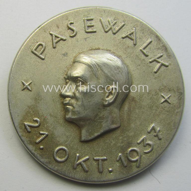 Commemorative, N.S.D.A.P.-related 'tinnie' or day-badge being a clearly maker- (ie. 'L.Chr. Lauer'-) marked example depicting detailed illlustration of 'Adolf Hitler' coupled with the text: 'Pasewalk - 21. Okt. 1937'