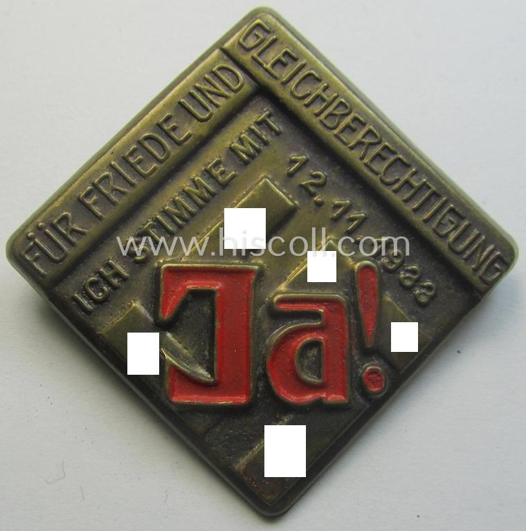 Partly bright-red-coloured, golden-bronze-toned N.S.D.A.P.-related day-badge (ie. 'tinnie' or: 'Veranstaltungsabzeichen'): 'Ja - Für Friede und Gleichberechtigung - Ich stimme mit - 12.11.1933'