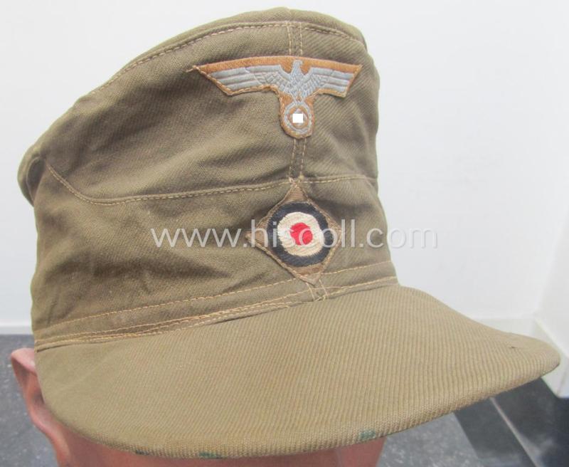 WH (Heeres), 'M41-pattern', tropical-issued field-cap (ie.: 'Tropen-Einheitsfeldmütze') being an (approx.) 57-cms.-sized example that is totally void of a makers'-, date- nor size-designation and that comes in a moderately worn- ie. used, condition