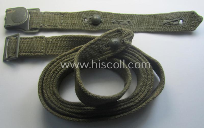 Complete, 2-pieced 'standard-issue'-pattern- (ie. typical WH-issue) carrying-strap (ie. 'Tragelasche') as was intended for the various gasmask-containers (being a maker-marked example that comes in a just minimally used, condition)