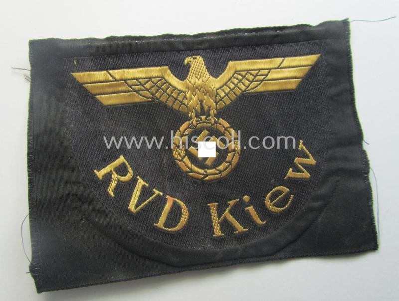 RB- ('Reichsbahn'-) related arm-eagle as executed in 'BeVo'-weave style, as was intended for an official of the: 'Deutsche Reichsbahn' ie. the: 'RVD Kiew' (or: 'Reichsverkehrsdirektion Kiew')