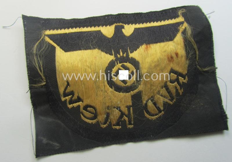 RB- ('Reichsbahn'-) related arm-eagle as executed in 'BeVo'-weave style, as was intended for an official of the: 'Deutsche Reichsbahn' ie. the: 'RVD Kiew' (or: 'Reichsverkehrsdirektion Kiew')