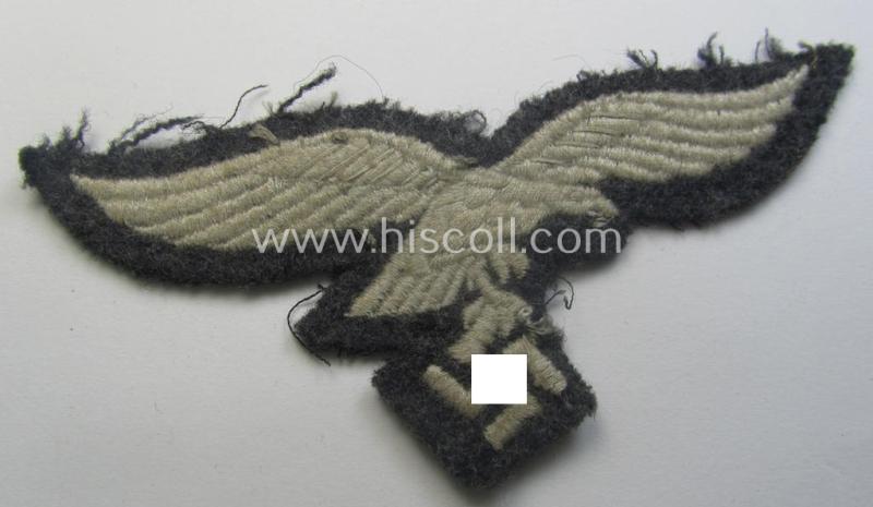WH (Luftwaffe) EM- (ie. eventually NCO-) type breasteagle (being a once tunic-attached example as executed in typical machine-embroidered-pattern)