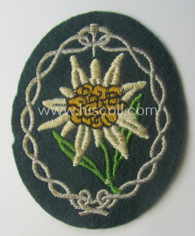 WH (Heeres) EM- (ie. NCO-) type: 'Edelweiss'-armpatch (being a machine-embroidered specimen)
