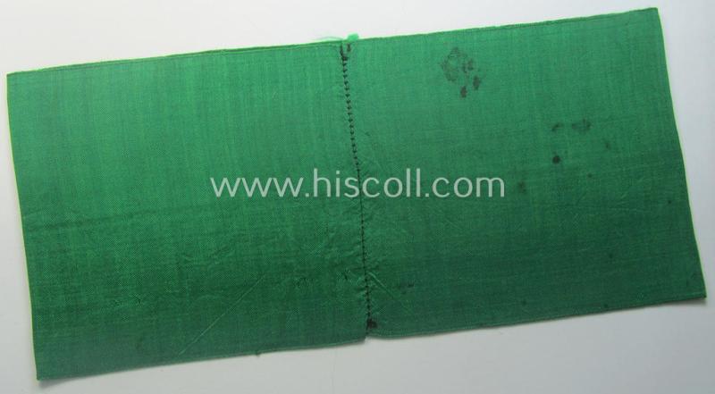 DRB- (ie. 'Deutsche Reichsbahn'-) related armband entitled: 'Reichsbahn' being of the 'entirely-woven'-type onto (typical) silk-like cloth in a technique similar to the 'BeVo'-weave pattern