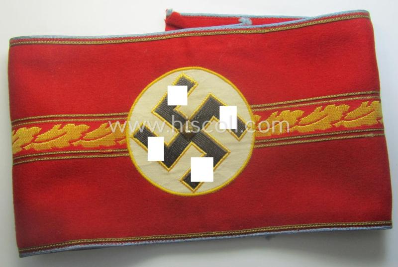 Stunning - and rarely encountered! - N.S.D.A.P.-type, 'smooth'-woolen-based armband (ie. 'Armbinde für politschen Leiter') as was intended for usage by an: 'N.S.D.A.P.-Ortsgruppenleiter' that still retains its period-attached 'RzM'-etiket