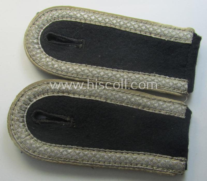 Pair of Waffen-SS NCO-type shoulderstraps as piped in the white-coloured branchcolour as was intended for usage by an: 'SS-Unterscharführer' who served within the: 'Waffen-SS Infanterie-Trpn.'