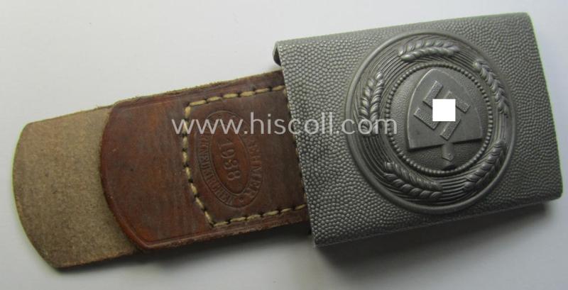 'Reichsarbeitsdienst'- (ie. RAD-) enlisted-mens'- (ie. NCO-) type belt-buckle being a maker- (ie. 'G. Brehmer-) marked example which is dated: '1938' and that comes mounted onto its leather-based tab