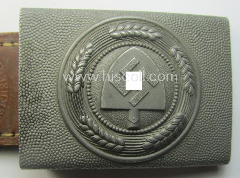 'Reichsarbeitsdienst'- (ie. RAD-) enlisted-mens'- (ie. NCO-) type belt-buckle being a maker- (ie. 'G. Brehmer-) marked example which is dated: '1938' and that comes mounted onto its leather-based tab
