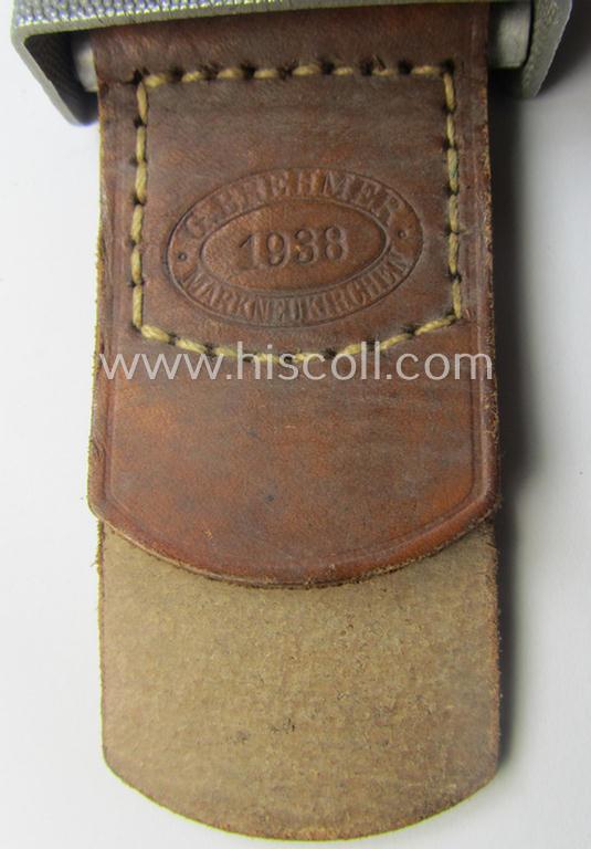 'Reichsarbeitsdienst'- (ie. RAD-) enlisted-mens'- (ie. NCO-) type belt-buckle being a maker- (ie. 'G. Brehmer-) marked example which is dated: '1938' and that comes mounted onto its leather-based tab