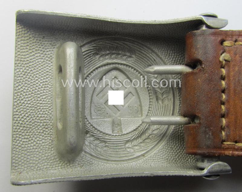 'Reichsarbeitsdienst'- (ie. RAD-) enlisted-mens'- (ie. NCO-) type belt-buckle being a maker- (ie. 'G. Brehmer-) marked example which is dated: '1938' and that comes mounted onto its leather-based tab