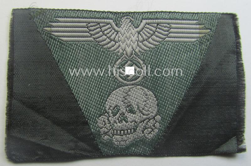 Superb - and simply never used nor cap-attached - Waffen-SS field-grey-coloured, M43-pattern cap-trapezoid as was intended for usage on the M43-model field-caps (ie. 'Einheitsfeldmützen') that comes in a 'virtually mint- ie. unissued', condition