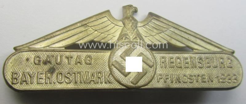 Unusual, silver-toned, N.S.D.A.P.-related day-badge (ie. 'tinnie') being a non-maker-marked example as was issued to commemorate a specific meeting entitled: 'Gautag Regensburg - Bayer.Ostmark - Pfingsten 1933'