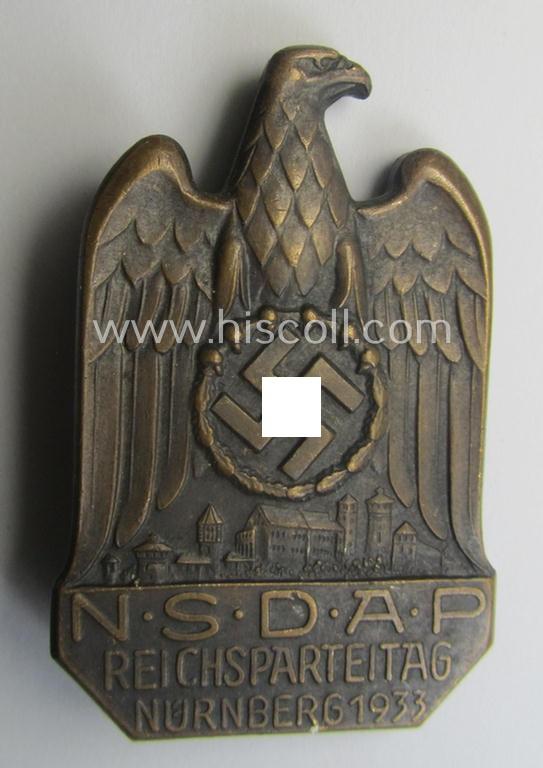 Repaired, N.S.D.A.P.-related 'tinnie' (ie. 'Tagungs- o. Veranstaltungsabzeichen'-) being a non-maker-marked, 'solid-back'-pattern and/or golden-bronze-toned example showing the text: 'N.S.D.A.P. Reichsparteitag - Nürnberg 1933'
