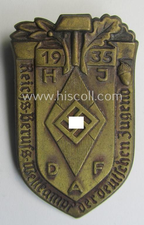 Commemorative, golden-bronze-toned, 'DAF'/'HJ'- (ie. 'Deutsches Arbeits Front o. Hitlerjugend'-) related 'tinnie' being a non-maker-marked example depicting a: 'HJ-raute' and text: 'Reichs-Berufs-Wettkampf der deutschen Jugend 1935'