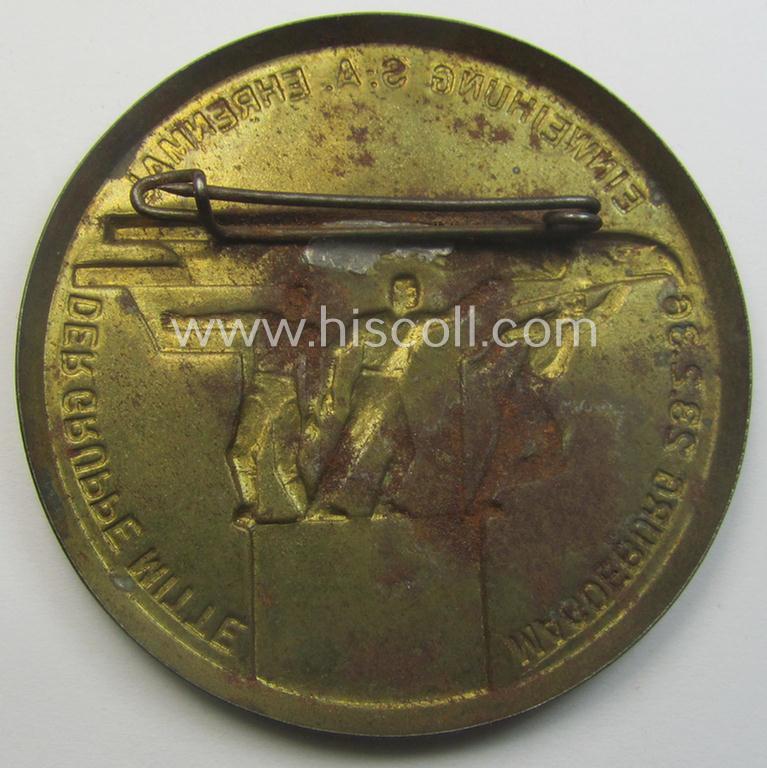 Commemorative SA- (ie. 'Sturmabteilungen'-) related 'tinnie' being a non-maker-marked example showing three sportsmen and eagle-statue coupled with the text: 'Einweihung S.A.-Ehrenmal der Gruppe Mitte - Magdeburg - 23.2.1936'