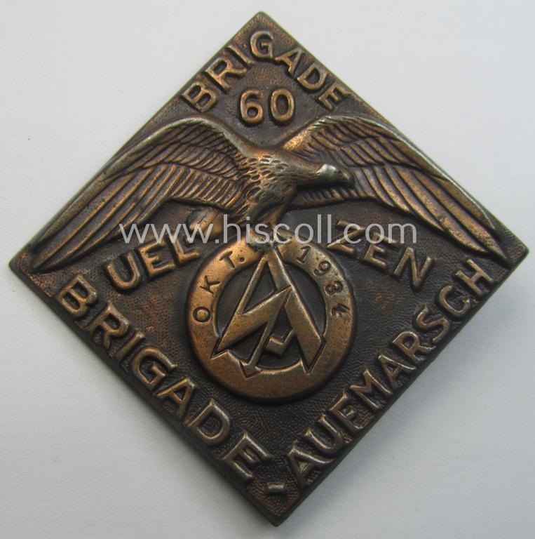 Unusually seen, commemorative SA- (ie. 'Sturmabteilungen'-) related 'tinnie' being a non-maker-marked example showing an eagle-device holding an SA-logo coupled with the text: 'Brigade-Aufmarsch - Brigade 60 - Uelzen - Okt. 1934'