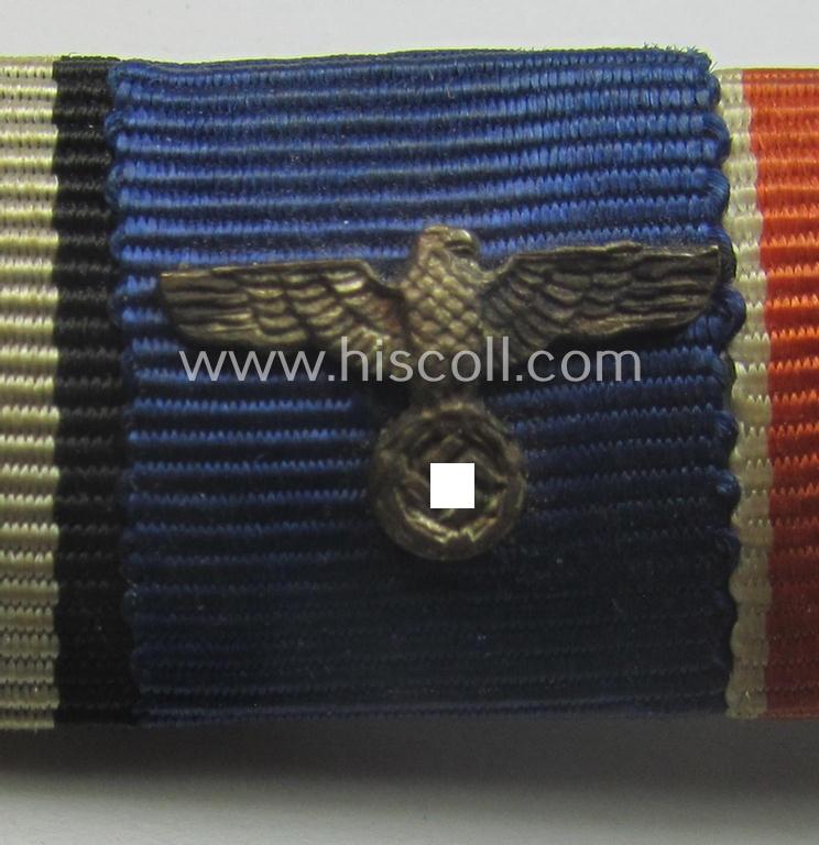 Neat, 3-pieced medal-bar (ie. 'Band- o. Feldspange') showing resp. the ribbons for an: 'EKII. Kl.', a: 'WH (Heeres) D.A. der 4. Stufe' and a: WH Memelland 'Anschluss'- (ie. occupation-) medal: '22 März 1939'