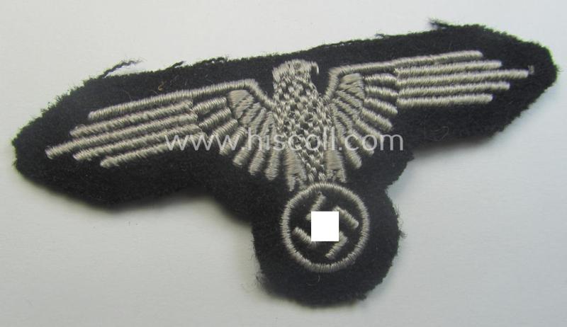 Mid- (ie. later-war-) pattern, 'SS' (ie. 'Waffen-SS') so-called: 'RzM-style' enlisted-mens'-/ie. NCO-pattern arm-eagle as was intended for usage by the various Waffen-SS troops throughout the war