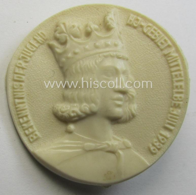Commemorative, 'HJ'- (ie. 'Hitlerjugend'-) related 'tinnie' being a maker- (ie. 'R. Sieper & Söhne'-) marked example depicting an illustration of Carl the Great surrounded by the text: 'Bekenntnis der Jugend - HJ-Gebiet Mittelelbe - Juli 1939'