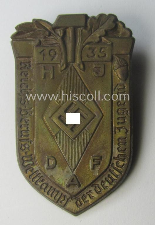 Commemorative, golden-bronze-toned, 'DAF'/'HJ'- (ie. 'Deutsches Arbeits Front o. Hitlerjugend'-) related 'tinnie' being a non-maker-marked example depicting a: 'HJ-raute' and text: 'Reichs-Berufs-Wettkampf der deutschen Jugend 1935'