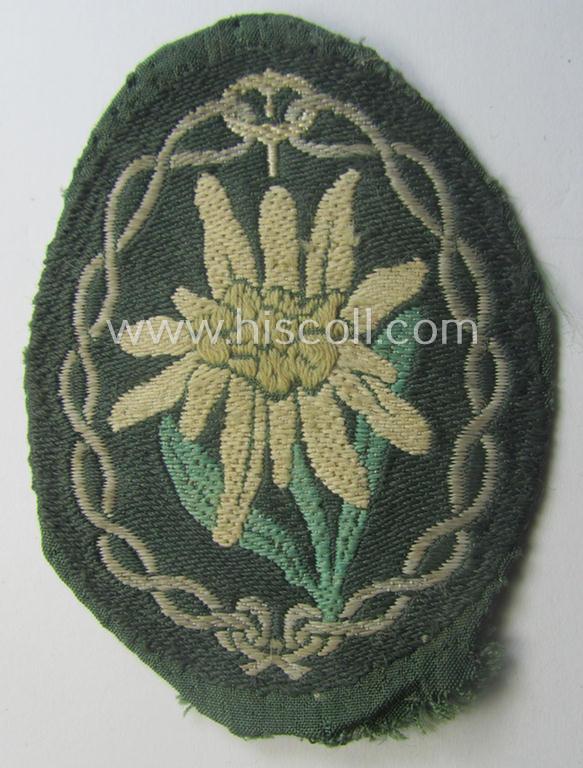 'Variant'- (ie. first-) pattern, WH (Heeres) 'Gebirgsjäger'- (ie. mountain-troopers-) related arm-badge being a desirable example as was executed in the 'BeVo'-weave pattern on a field-grey-coloured background