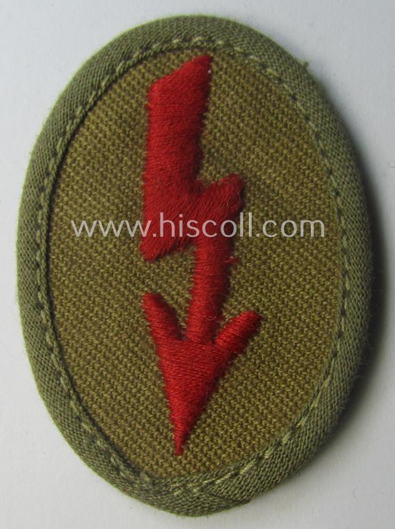 WH (Heeres) 'tropical-styled', trade- and/or special-career insignia (or: 'Signal Blitz') as was intended for a soldier who served within the: 'Artillerie-Trpn.'