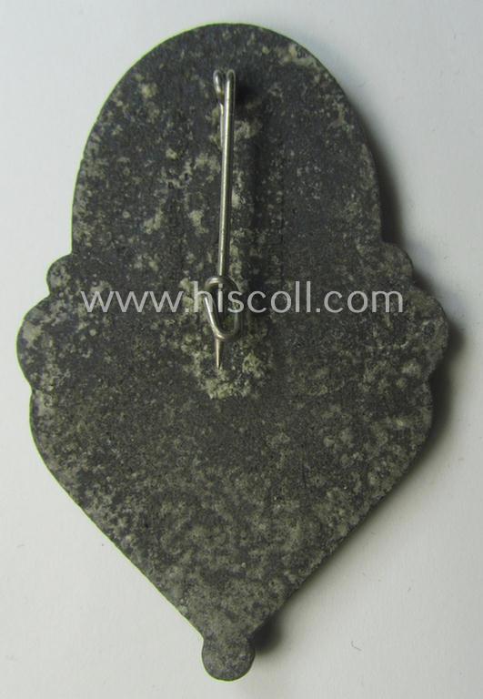 Commemorative, greyish-coloured, N.S.D.A.P.-related 'tinnie' being a non-maker-marked example depicting an illustration of 3 upward-positioned swords and various TR-period organisational logos and text: 'Gautag - 21.22. Mai 1938 - Leipzig'