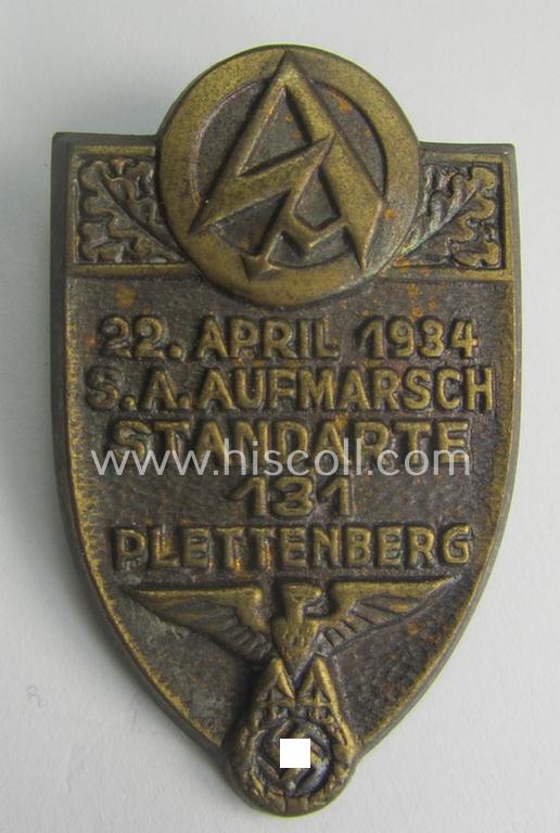 Golden-bronze-toned, SA-related day-badge (ie. 'tinnie' or: 'Veranstaltungsabzeichen') as was issued to commemorate the: 'S.A. Aufmarsch - Standarte 131 - Plettenberg - 22. April 1934'