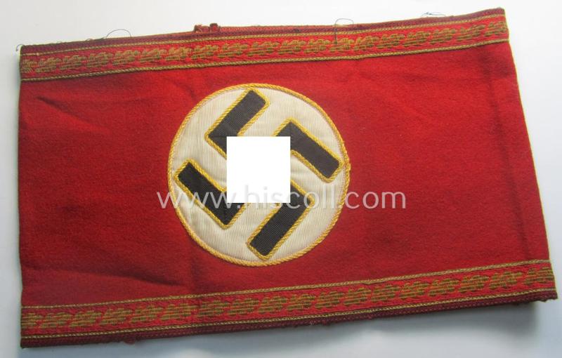 Stunning - and equally very rarely encountered! - N.S.D.A.P.-type, smooth-woolen-based armband (ie. 'Armbinde') as was intended for usage by an: 'N.S.D.A.P. Gauleiter eines Amtes' that still retains its period 'RzM'-etiket