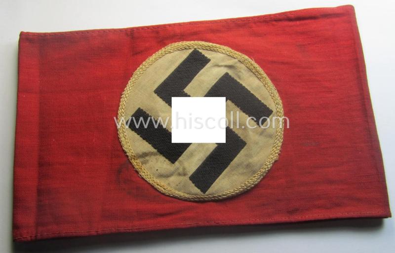 Moderately used- ie. worn, linnen-based N.S.D.A.P.-related party-armband (ie. 'Armbinde')