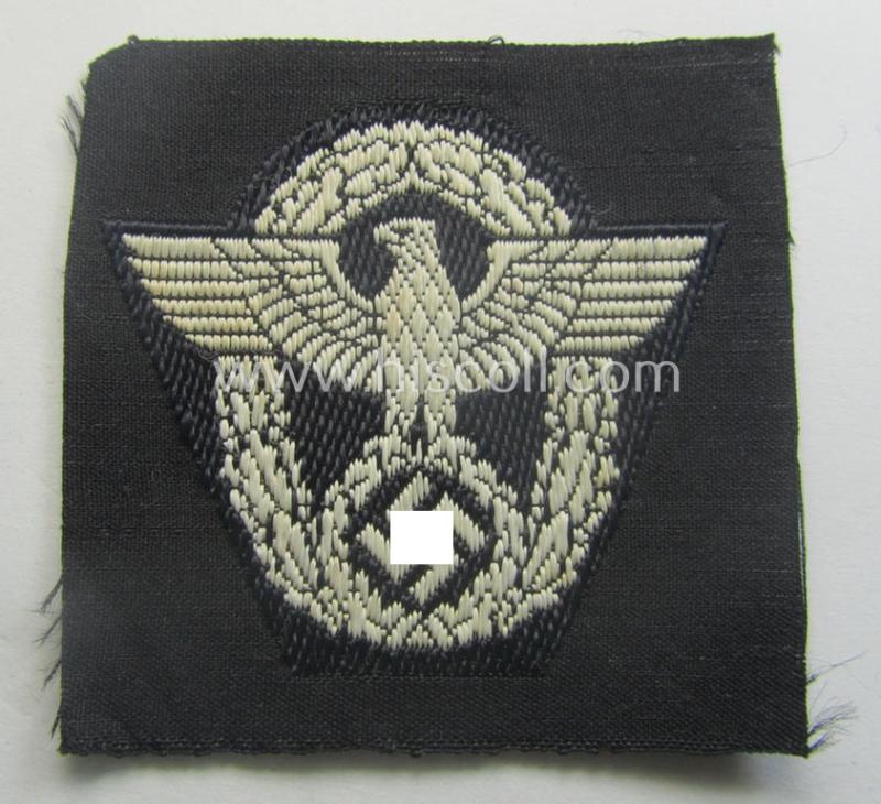 Police ie. 'Polizei'- (ie. 'SS-Polizei'-) 'BeVo'-woven, EM- (ie. NCO-) pattern cap-eagle (ie. 'Adler für Schiffchenmütze o. Einheitsfeldmütze der Polizei o. SS-Polizei')