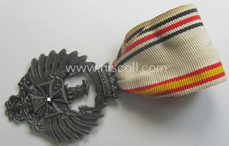 Attractive example of a Spanish-issued, campaign-medal of the Spanish Blue Division in Russia called: 'Medalla Conmemorativa Division Azul - Medalla de Tropa 1941' that comes mounted on its period ribbon as issued and/or worn