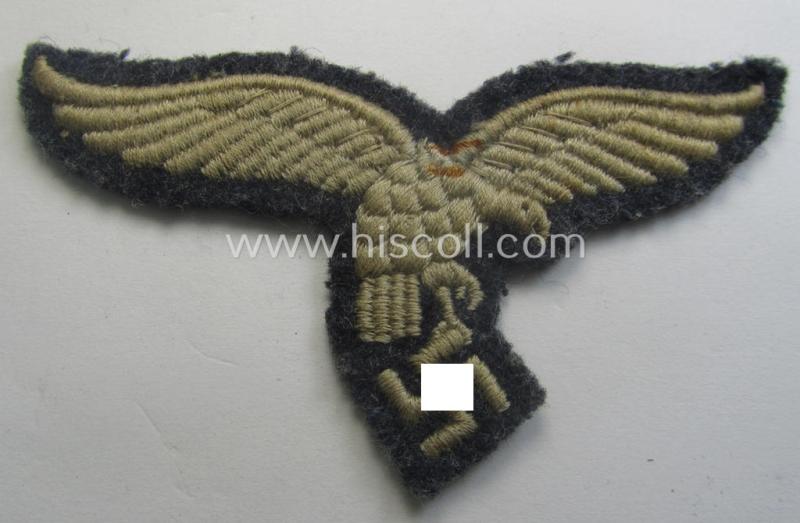 Truly used- ie. worn, WH (Luftwaffe) EM- (ie. NCO-) 'down-tailed'-pattern breast-eagle
