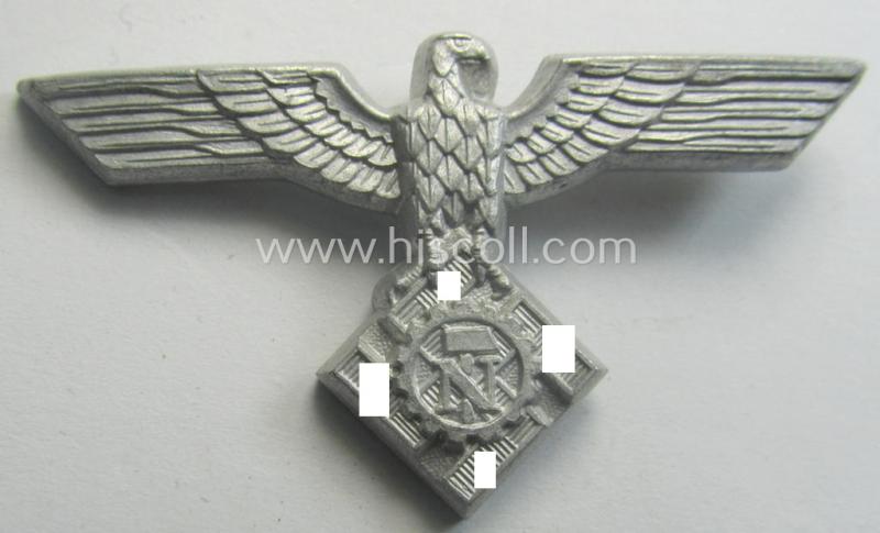 Scarcely found, OT (ie.: 'Organisation Todt') silver-toned (ie. aluminium-based), EM- (ie. NCO- or officers') type visor-cap-eagle being a non-maker-marked example that comes in a simply never cap-attached- ie. still 'virtually mint', condition