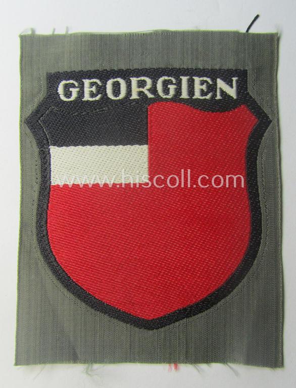 'BeVo'-type armshield entitled: 'Georgien' (being a 'virtually mint- ie. unissued' example as intended for a volunteer who served within the 'Deutsche Wehrmacht' ie. within the 'Georgisches Legion')