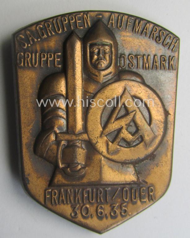 Reddish-bronze-toned, SA-related day-badge (ie. 'tinnie' or: 'Veranstaltungsabzeichen') as was issued to commemorate the: 'S.A. Gruppen-Aufmarsch - Gruppe Ostmark - Frankfurt/Oder - 30.6.35'