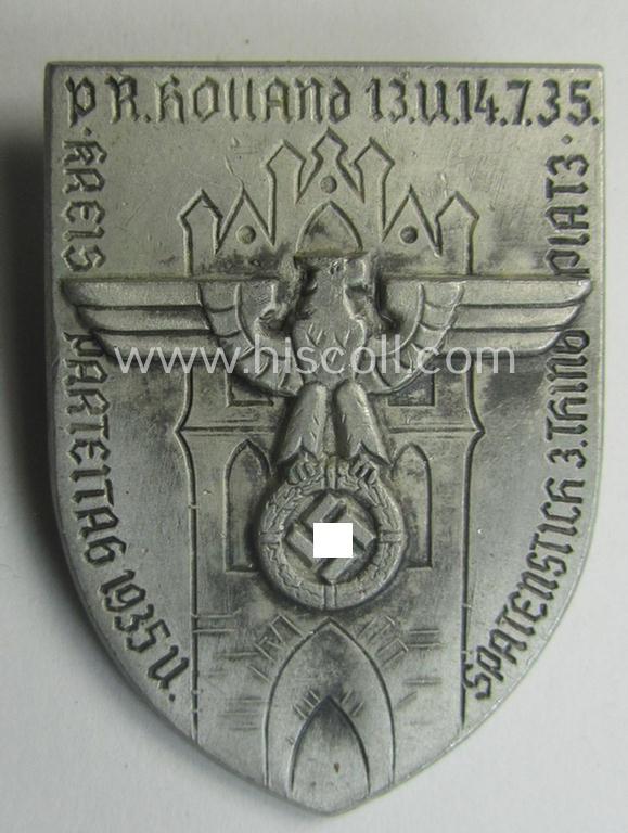 Attractive - and never before seen! - aluminium-based) N.S.D.A.P.-related day-badge (ie. 'tinnie' or: 'Veranstaltungsabzeichen') as was issued to commemorate the: 'Kreisparteitag 1935 u. Spatenstich - 3.Thinbplatz - Pr.Holland - 13. u. 14.7.35'